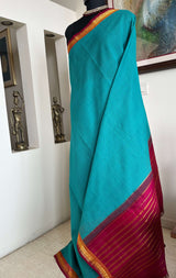 VRITIKA - SUBTLE BLUE GADWAL COTTON SAREE WITH RED ZARI BORDER