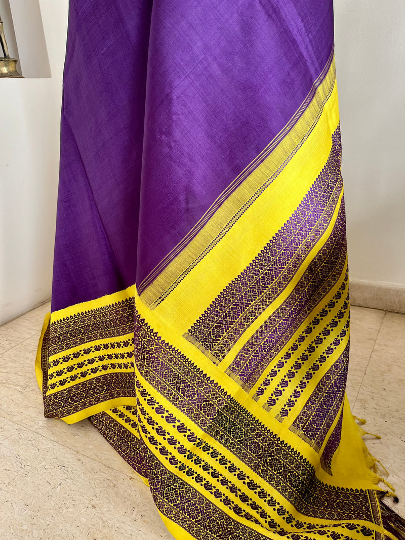 CHARINI – PURPLE KORVAI KANJIVARAM WITH YELLOW BORDER AND MOTIFS