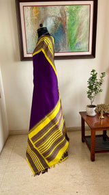 CHARINI – PURPLE KORVAI KANJIVARAM WITH YELLOW BORDER AND MOTIFS