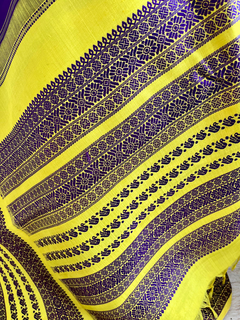 CHARINI – PURPLE KORVAI KANJIVARAM WITH YELLOW BORDER AND MOTIFS