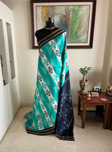 PRASHEELA - TEAL POCHAMPALLY SILK WITH FLORAL MOTIFS AND RUDRAKSHA BORDER