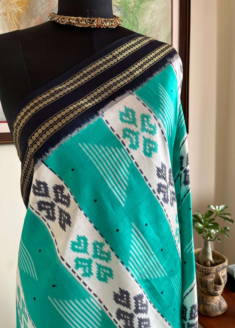 PRASHEELA - TEAL POCHAMPALLY SILK WITH FLORAL MOTIFS AND RUDRAKSHA BORDER