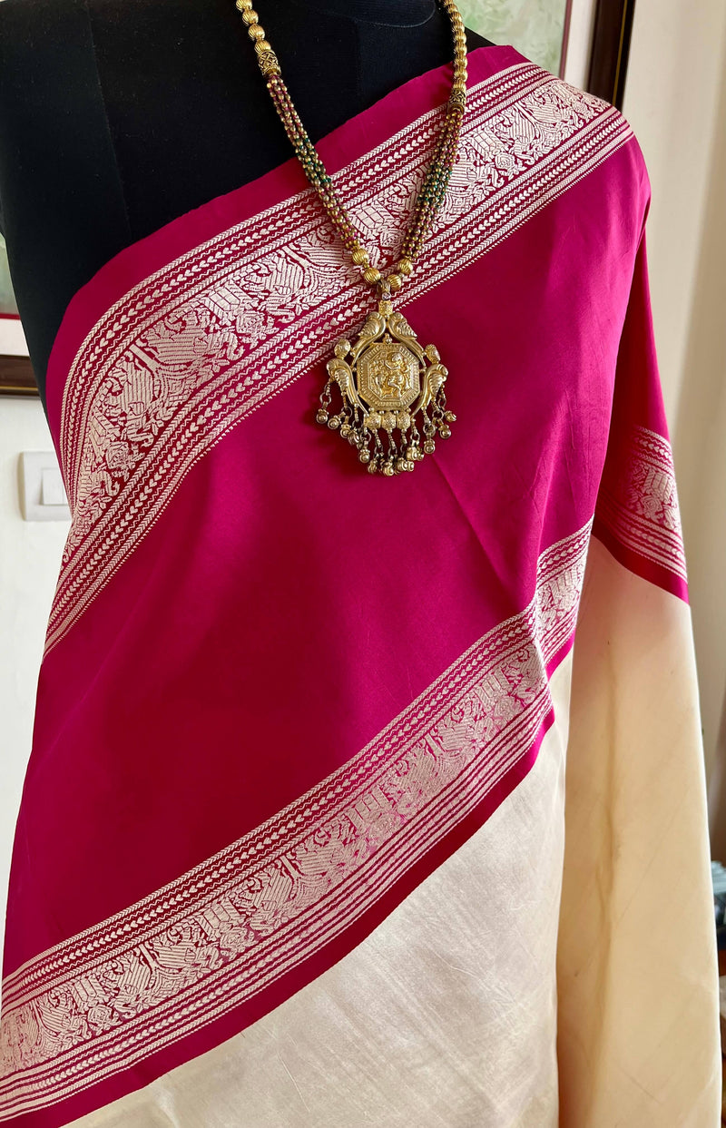 ARIYANA- REGAL KANJIVARAM IN OFFWHITE WITH PINKISH MAROON