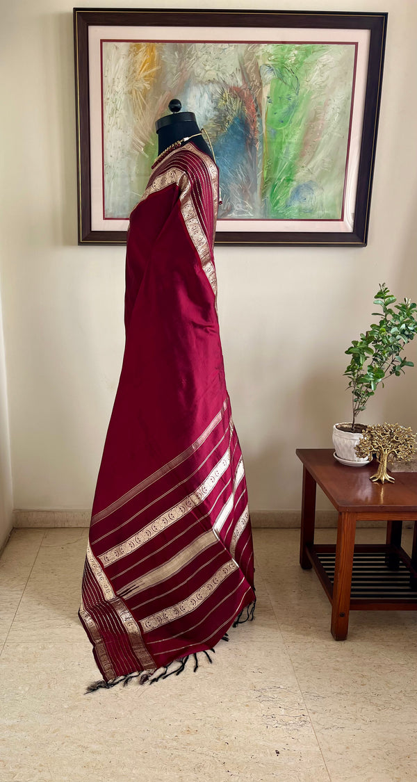 PAURAVI – RICH MAROON KANJIVARAM SILK SAREE WITH SILVER ZARI