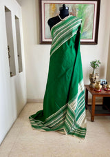 KALAA- ELEGANT GREEN KANJIVARAM WITH FLORAL AND PAISLEY BORDERS