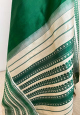 KALAA- ELEGANT GREEN KANJIVARAM WITH FLORAL AND PAISLEY BORDERS