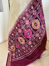 PRACHITA – CREAM TUSSAR KHANDUA WITH COFFEE MAROON RUDRAKSHA BORDER