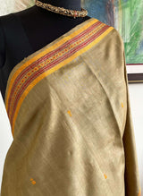 TISHYA - BEIGE BANARASI TUSSAR SAREE WITH INTRICATE FLORAL PATTERNS