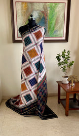 MRIGANKAA – VIBRANT ASHWINI COTTON SAREE WITH BLACK AANCHAL FLORALS