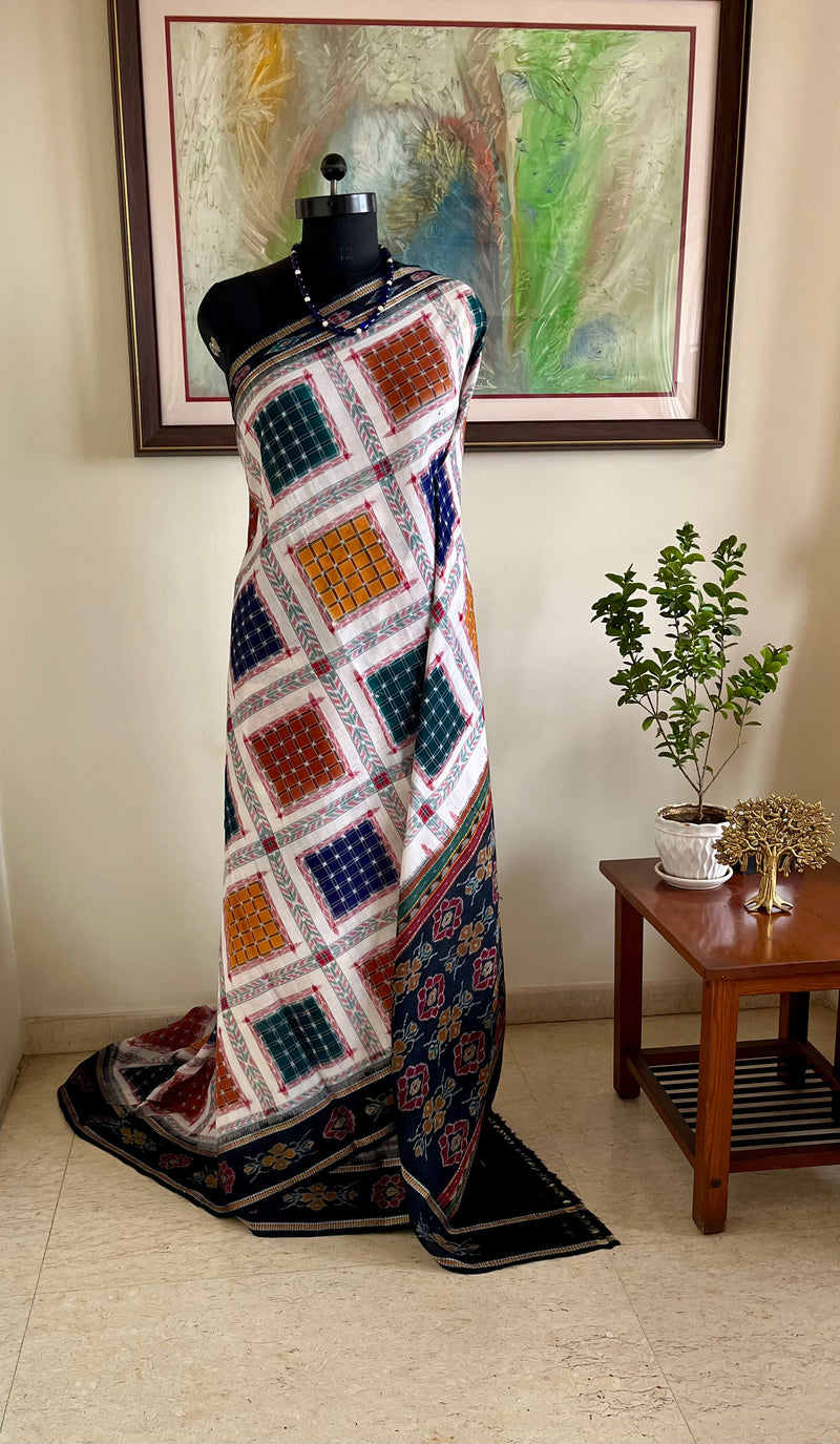 MRIGANKAA – VIBRANT ASHWINI COTTON SAREE WITH BLACK AANCHAL FLORALS