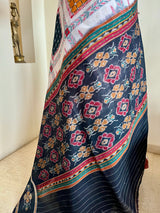 MRIGANKAA – VIBRANT ASHWINI COTTON SAREE WITH BLACK AANCHAL FLORALS