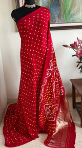 SAROJ- RADIANT RED GAJI SILK LAGDI PATTA WITH ZARI AND BANDHANI MOTIFS