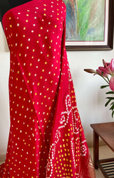 SAROJ- RADIANT RED GAJI SILK LAGDI PATTA WITH ZARI AND BANDHANI MOTIFS