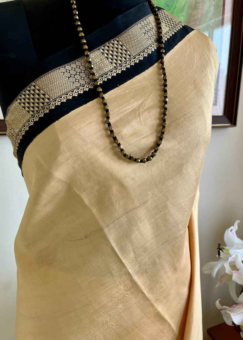 MENA – CREAM AND BLACK KORVAI WITH THAZHAMPOO MOTIFS