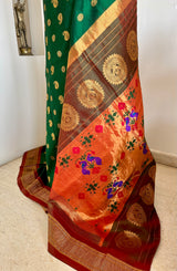 MILANIKA – GREEN PAITHANI WITH BANGDI MOR, MOR KUNDA AND NARALI BORDER