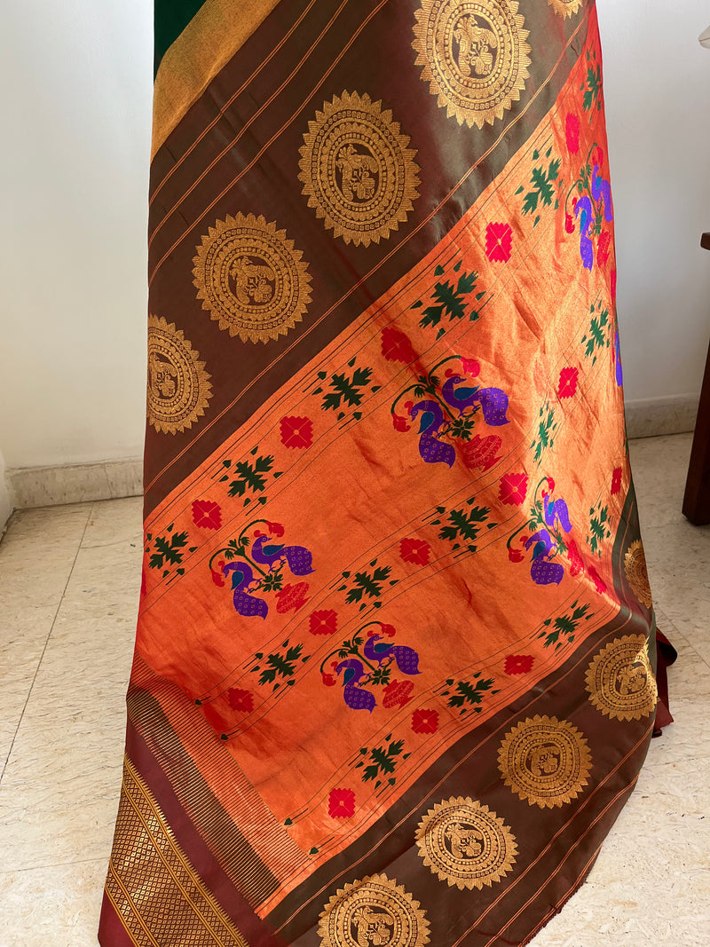 MILANIKA – GREEN PAITHANI WITH BANGDI MOR, MOR KUNDA AND NARALI BORDER
