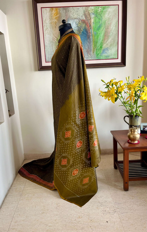 GHANAVI - OLIVE GREEN POCHAMPALLY WITH RUST RED IKAT AANCHAL MOTIFS