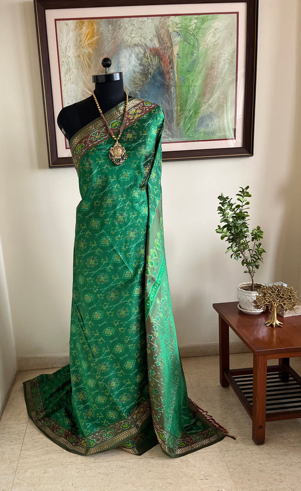 DITYAA – GREEN POCHAMPALLY SILK WITH ZARI AND IKKAT MOTIFS