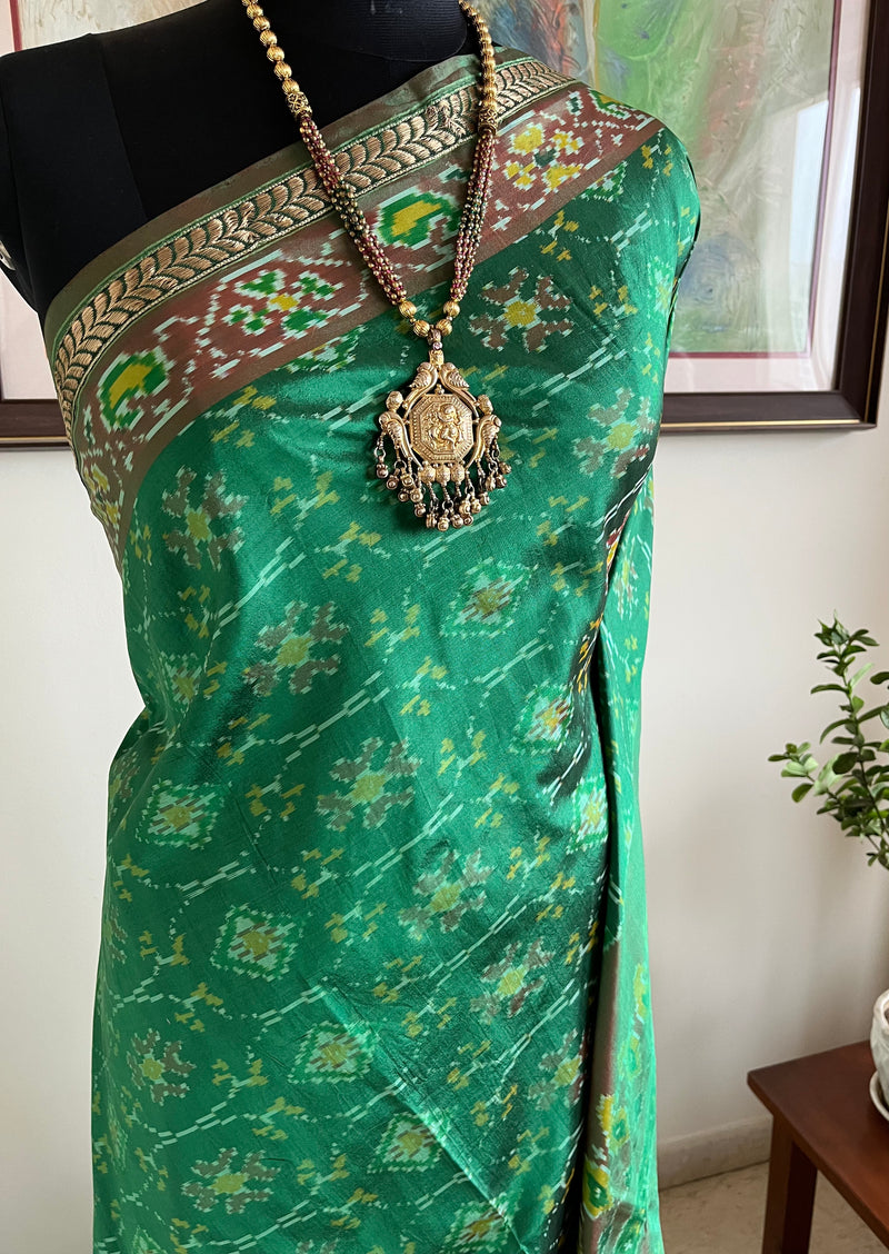 DITYAA – GREEN POCHAMPALLY SILK WITH ZARI AND IKKAT MOTIFS