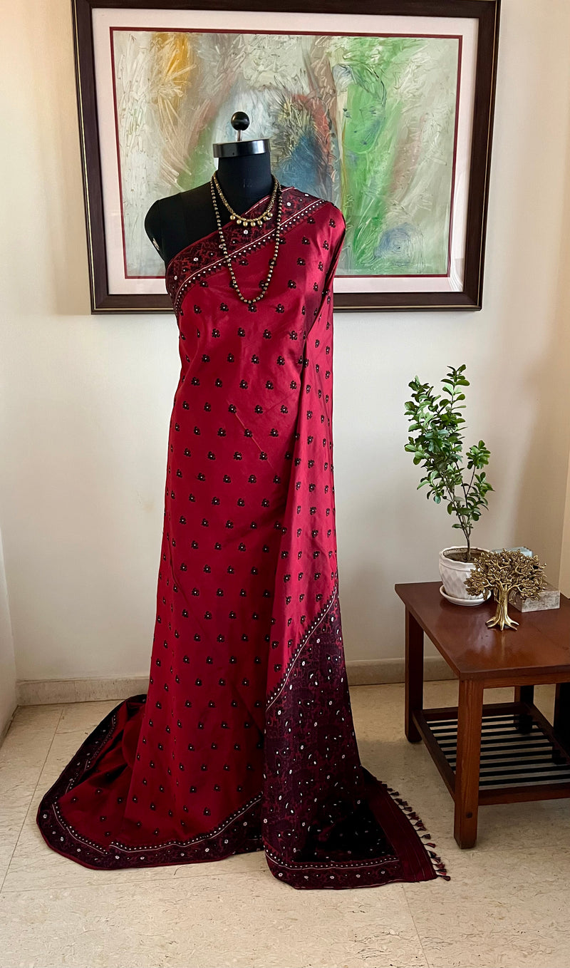 IDITA – ASSAM SILK IN DUAL MAROON WITH FLORAL MOTIFS