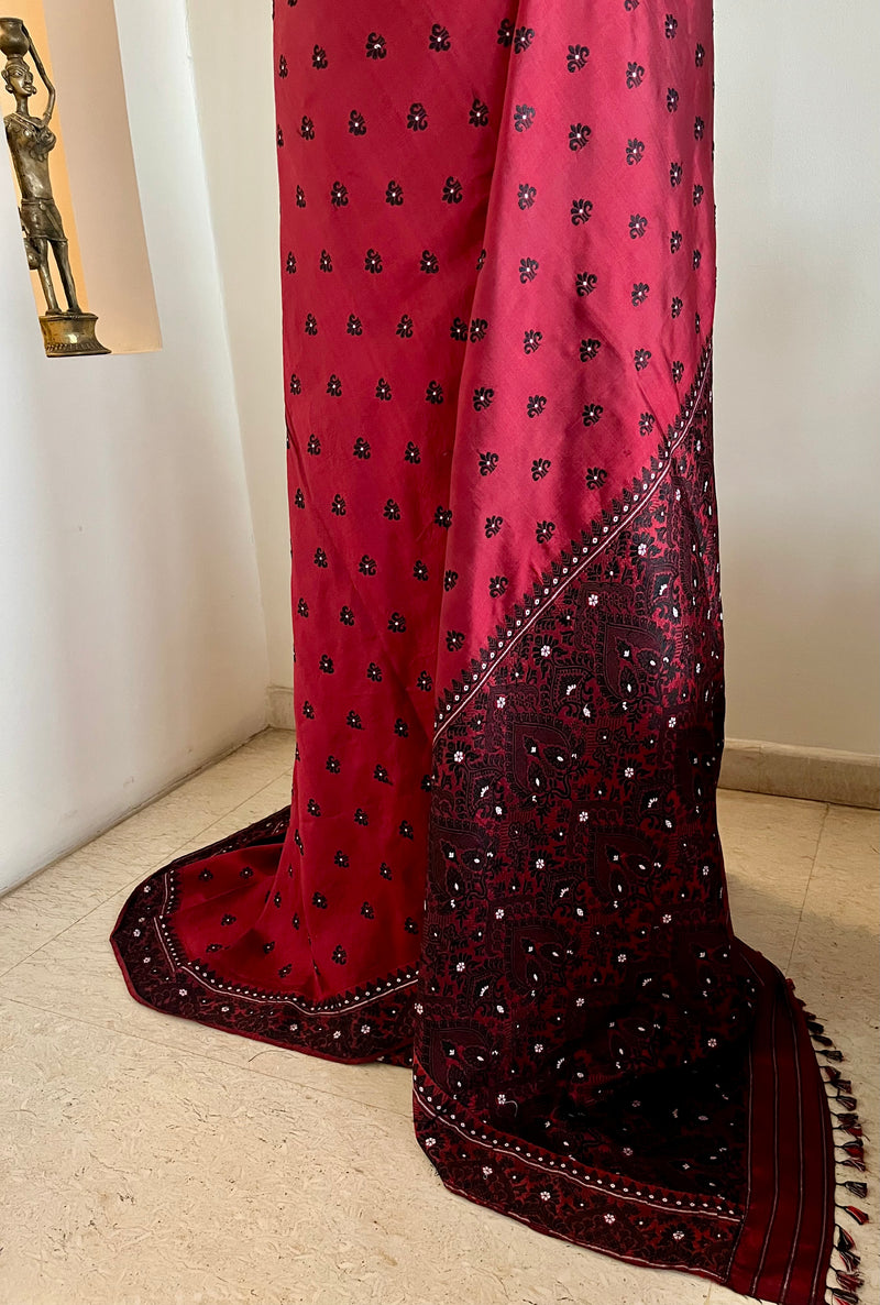IDITA – ASSAM SILK IN DUAL MAROON WITH FLORAL MOTIFS