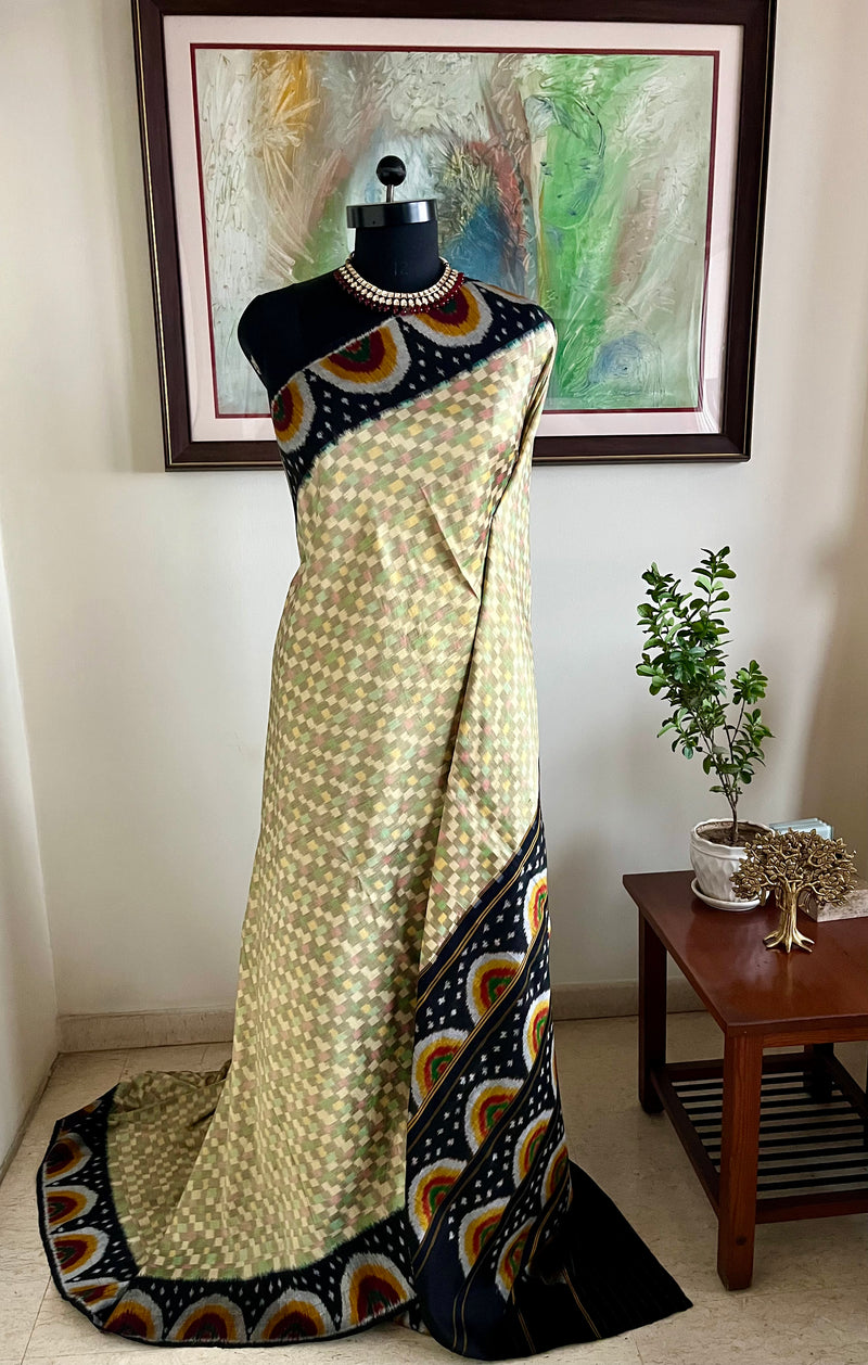 JAGRITI – PUTAPAKKA IKKAT IN CREAM WITH ARCH MOTIF BORDER