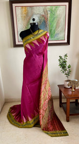 PUSPANJALI- MAGENTA PINK KHANDUA WITH TEMPLE BORDERS AND FLORAL BANDHA AANCHAL
