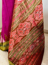 PUSPANJALI- MAGENTA PINK KHANDUA WITH TEMPLE BORDERS AND FLORAL BANDHA AANCHAL