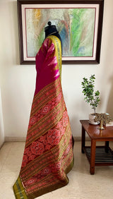 PUSPANJALI- MAGENTA PINK KHANDUA WITH TEMPLE BORDERS AND FLORAL BANDHA AANCHAL