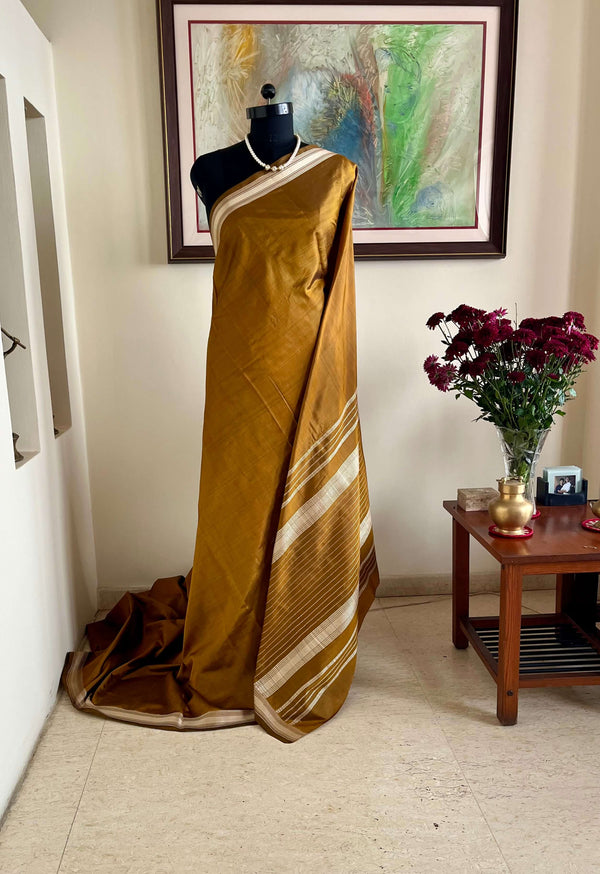 VASANTIKA - OCHRE SILK SAREE WITH PHODA TECHNIQUE WORK