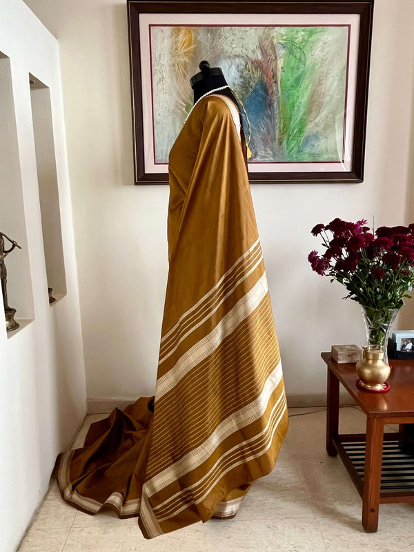 VASANTIKA - OCHRE SILK SAREE WITH PHODA TECHNIQUE WORK