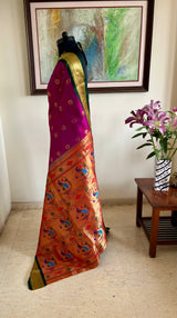 SUVEE - MAGENTA PAITHANI WITH NARALI BORDER AND PEACOCK AANCHAL