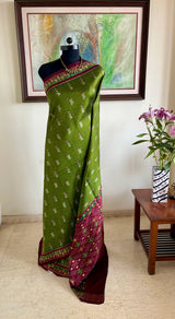 AVANITA GREEN PATOLA WITH IKKAT BORDER AND FLORALS