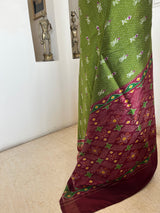 AVANITA GREEN PATOLA WITH IKKAT BORDER AND FLORALS