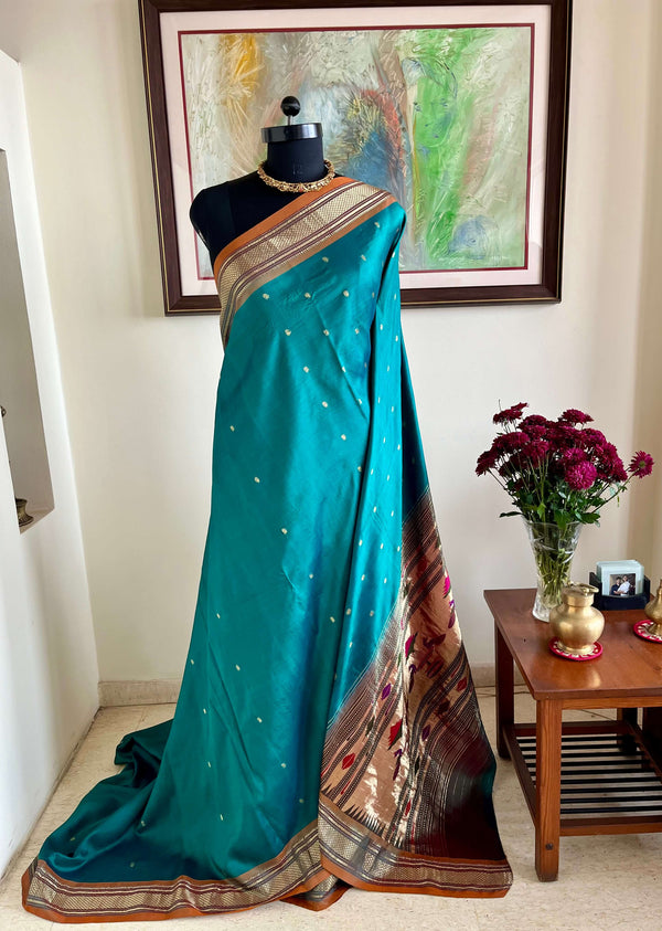 KAUMUDI- TEAL PAITHANI WITH MOR KUNDA AANCHAL AND NARALI BORDER