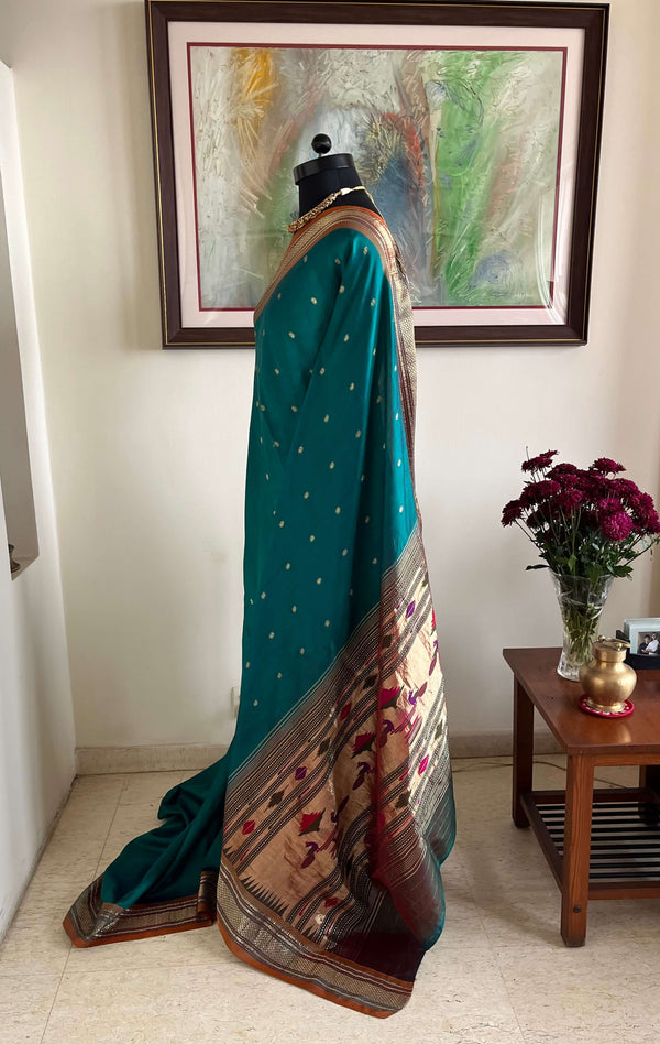 KAUMUDI- TEAL PAITHANI WITH MOR KUNDA AANCHAL AND NARALI BORDER