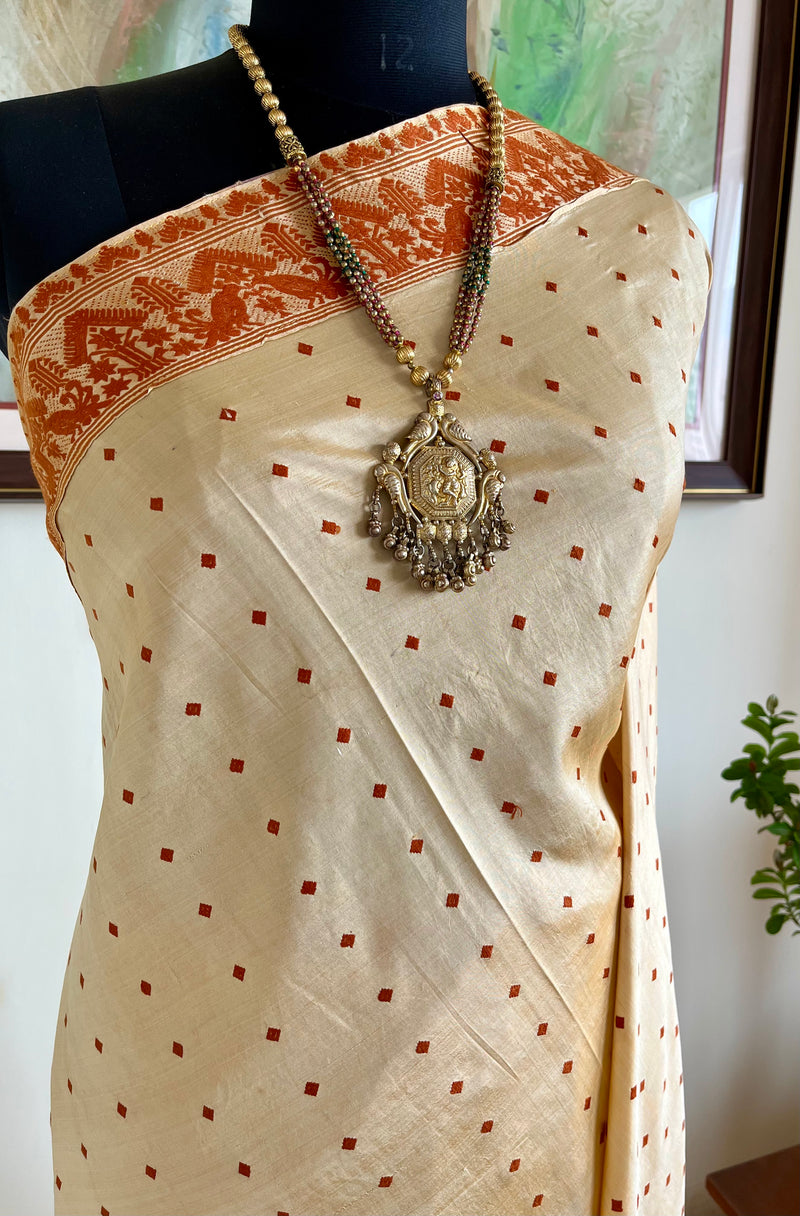KANGKANA - ASSAM SILK SAREE IN CREAM AND RUST WITH GOS AND MOYUR MOTIFS