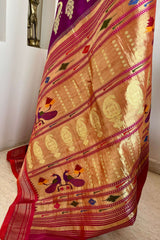 RUJUTA- UNIQUE PAITHANI SAREE IN REGAL PURPLE WITH ZARI PEACOCKS