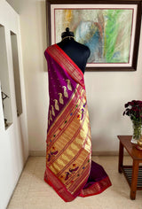 RUJUTA- UNIQUE PAITHANI SAREE IN REGAL PURPLE WITH ZARI PEACOCKS