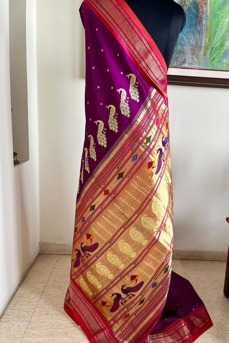 RUJUTA- UNIQUE PAITHANI SAREE IN REGAL PURPLE WITH ZARI PEACOCKS