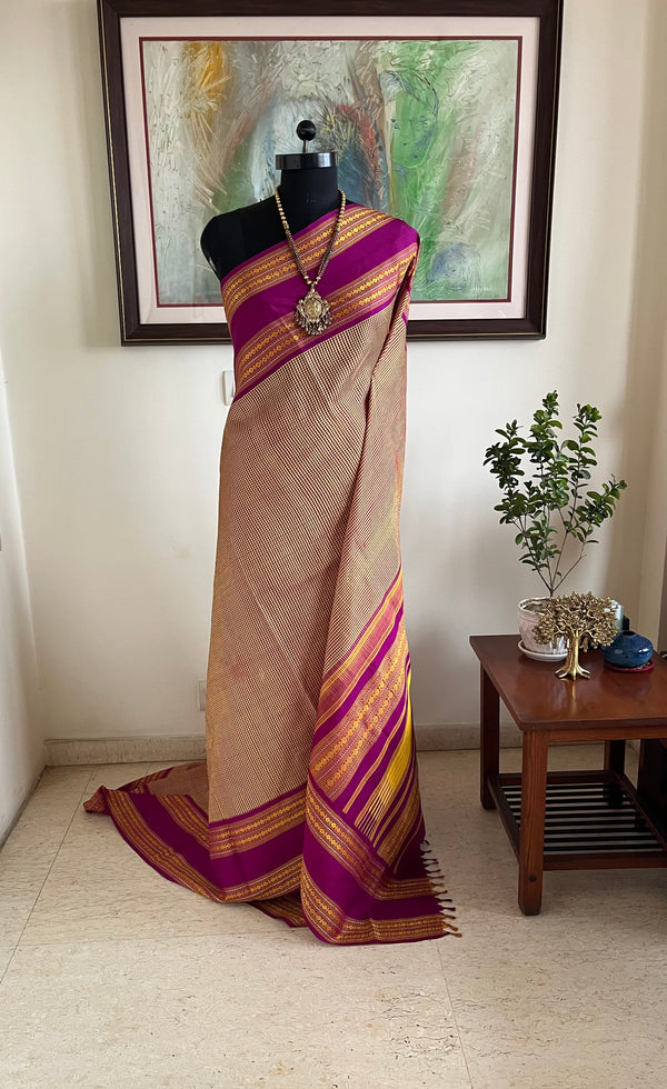 RITHISHA- BEIGE AND BROWN CHECKS KANJIVARAM WITH MAGENTA RUDRAKSHA BORDERS