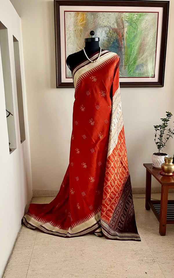 ANITA - RUST BOMKAI SAREE WITH DOLL AND RUDRAKSHA MOTIFS