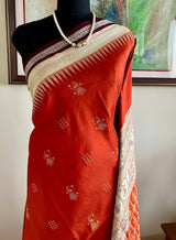 ANITA - RUST BOMKAI SAREE WITH DOLL AND RUDRAKSHA MOTIFS