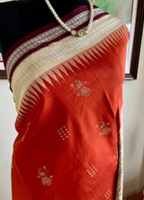 ANITA - RUST BOMKAI SAREE WITH DOLL AND RUDRAKSHA MOTIFS