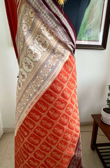 ANITA - RUST BOMKAI SAREE WITH DOLL AND RUDRAKSHA MOTIFS