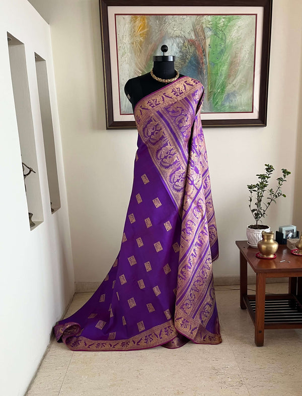 DEBARATI- PURPLE BALUCHARI WITH MYTHOLOGICAL MOTIFS AND DOUBLE AANCHAL