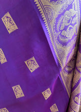 DEBARATI- PURPLE BALUCHARI WITH MYTHOLOGICAL MOTIFS AND DOUBLE AANCHAL