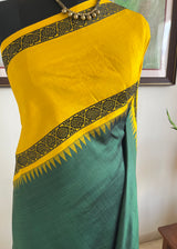GOMIKA- TEAL GREEN KANJIVARAM WITH YELLOW BORDER AND RUDRAKSHA