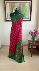 BISWAJITA - CORAL POCHAMPALLY IKAT WITH GREEN TEMPLE BORDER