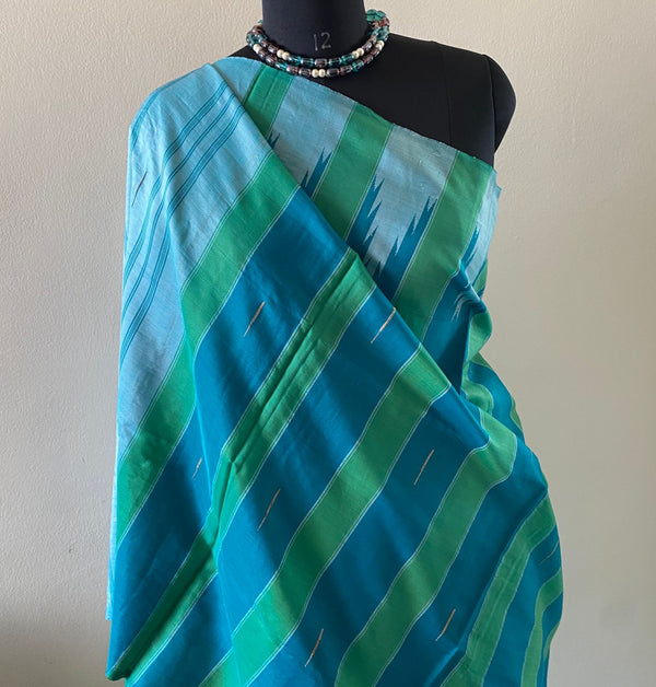 TANUJA- A STUNNING ART SILK SAREE WITH GREEN AND LIGHT BLUE VERTICAL STRIPES AND A BEAUTIFUL TEMPLE BORDER